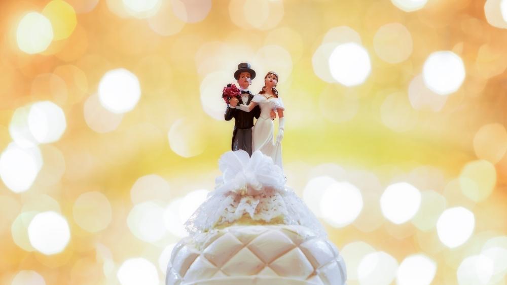 ¿Cuál es el origen de las figuras nupciales de las tartas?